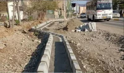عملیات‌نصب جدول  حاشیه  میدان کتاب (ابتدای خیابان ۱۴ معصوم)