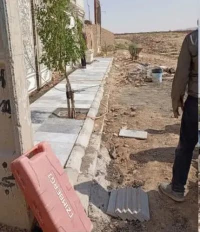 عملیات‌ کفسازی وسنگ فرش پیاده روکوچه شهید نیازمند ۲۸