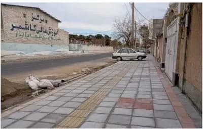 عملیات کفسازی وموزاییک فرش پیاده روضلع جنوبی خیابان ایثارگران