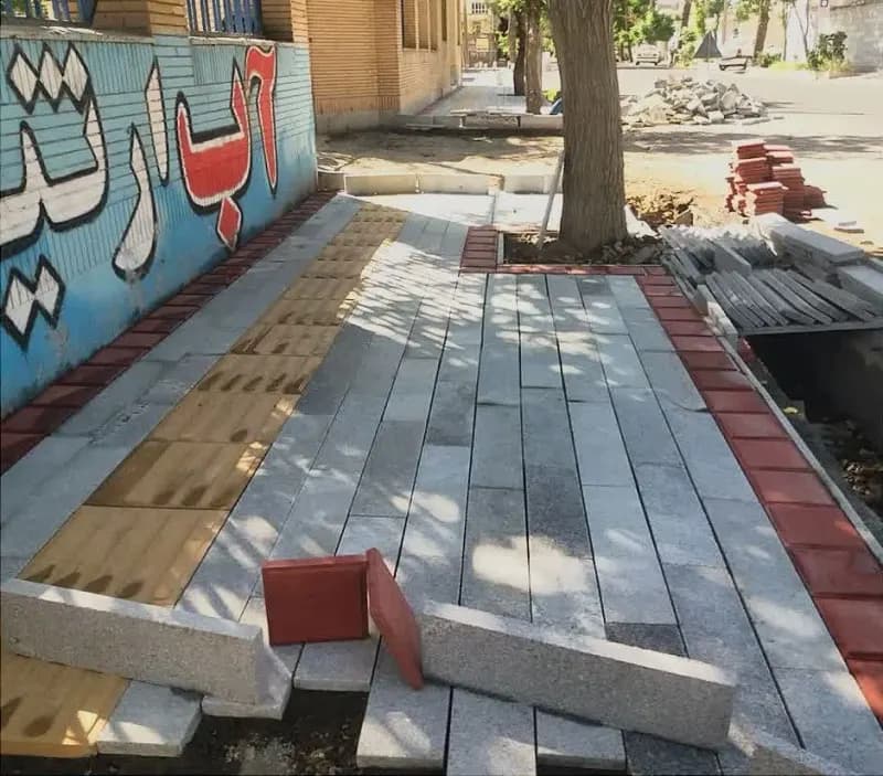 گزارش تصویری: کف سازی پیاده روضلع جنوبی خیابان شهیدچمران