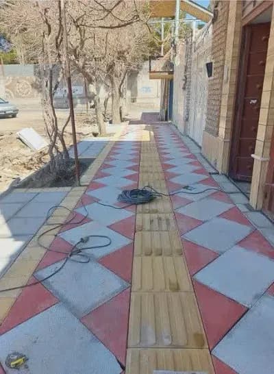 📷گزارش تصویری|  عملیات کفسازی وموزاییک فرش پیاده رو کوچه شهید مطهری ۱