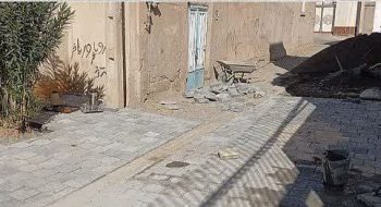 ادامه‌عملیات کفسازی ونصب تایل بتنی کوچه ۱۷شهریور۱۳