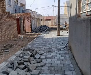 عملیات نصب جدول کانیووسط ونصب تایل بتنی انتهای کوچه‌۱۵خرداد۵ سمت چپ